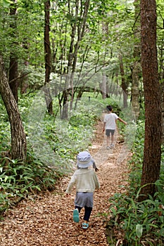 Japanese brother and sister on a hike