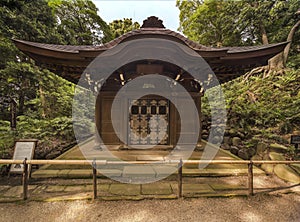 Japanese buddhist Pavilion in the forest of Koishikawa Korakuen