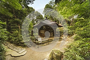 Japanese buddhist Pavilion in the forest of Koishikawa Korakuen