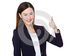 Japanese business woman going thumb up