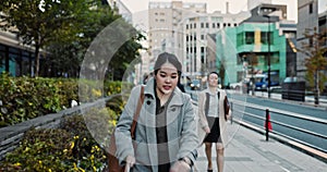 Japanese businesswoman, phone call and check time by run to work, late and meeting appointment in city. Young person