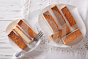 Japanese cake kasutera close-up on a plate. Horizontal top view