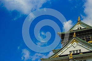 Japanese Castle background view with beautiful blue skies and Osaka Castle, Japan