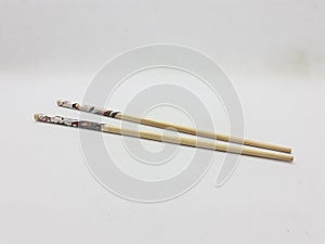 Japanese Chinese Bamboo Wooden Artistic Chopsticks for Traditional Eatery Tools in White Isolated Background