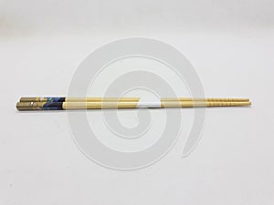 Japanese Chinese Bamboo Wooden Artistic Chopsticks for Traditional Eatery Tools in White Isolated Background