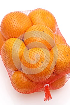 Japanese citrus mikan fruit in a plastic bag