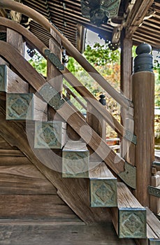 Japanese classic architecture of wooden stairway to a shrine