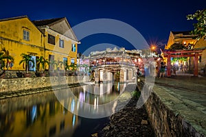 Japanese Covered ancient Bridge and River in Street in Old city of Hoi An in Southeast Asia in Vietnam. Vietnamese heritage and