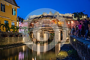 Japanese Covered ancient Bridge and River in Street in Old city of Hoi An in Southeast Asia in Vietnam. Vietnamese heritage and