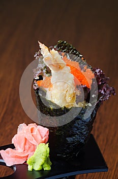 japanese cuisine. hand roll on the background