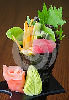Japanese cuisine. hand roll on the background
