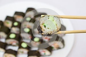 Japanese cuisine, rice sushi and fish - closeup