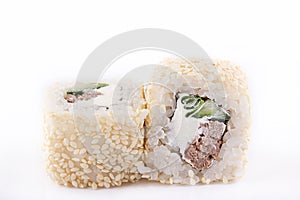 Japanese Cuisine, Sushi Set: roll with veal, cream cheese, cucumber, green onion and sesame on a white background.