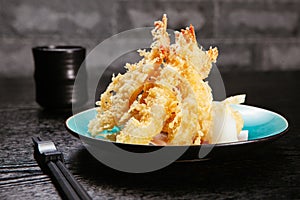 Japanese cuisine. tempura prawn on the background. Fried, breaded.