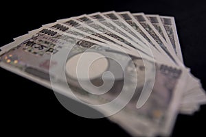 Japanese currency 100,000 yen on the black background
