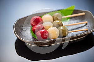 Japanese Dango dessert with 3 different color photo