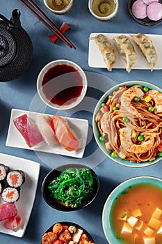 Japanese dinner, overhead flat lay shot of a variety of dishes of Japan