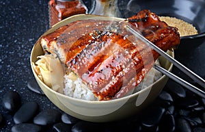 Japanese eel grilled with rice or Unagi don. photo