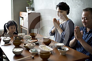 Japanese family dining together with happiness