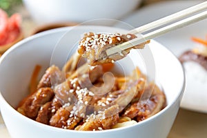 japanese food chicken katsu don served in white bowl with chopsticks