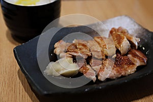 Japanese food , Chicken teriyaki with rice on wooden table