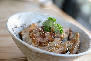 Japanese food , Chicken teriyaki with rice on wooden table