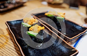 Japanese food, Fresh Uni sushi with cucumber