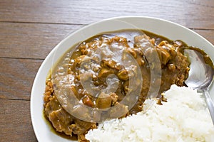 Japanese food fried pork tongkatsu curry with wood pattern (Katsukare)