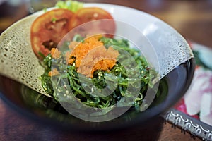 Japanese food ,seaweed salad topping with ebiko