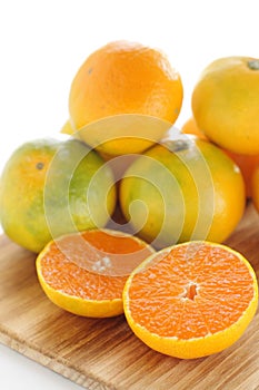 Japanese fruit, halved mikan mandarin orange