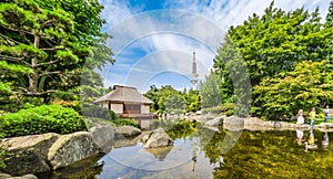 Japanese Garden (Planten un Blomen park) with Heinrich-Hertz-Turm, Hamburg, Germany