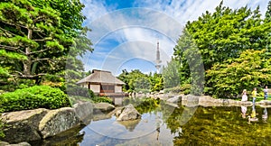 Japanese Garden (Planten un Blomen park) with Heinrich-Hertz-Turm, Hamburg, Germany photo