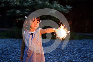 Japanese girl doing handheld fireworks