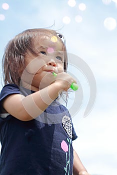 Japanese girl playing with bubble