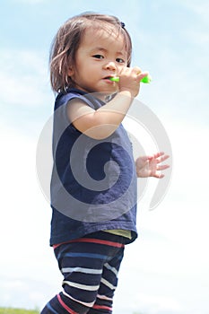 Japanese girl playing with bubble