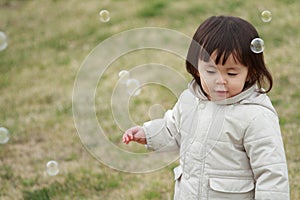 Japanese girl playing with bubble