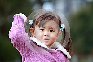 Japanese girl playing catch