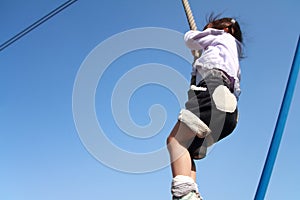 Japanese girl playing with flying fox