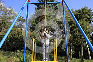 Japanese girl playing with flying fox