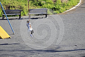 Japanese girl playing with flying fox