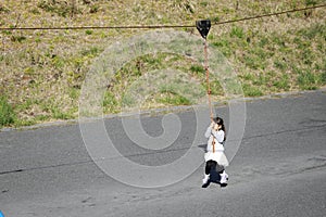 Japanese girl playing with flying fox