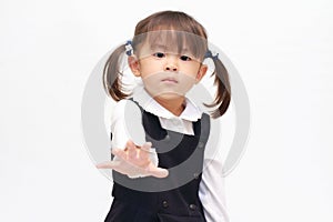 Japanese girl playing rock-paper-scissor in formal wear paper