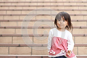 Japanese girl standing on the stairs