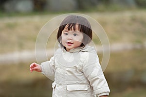 Japanese girl taking a walk in the park