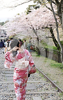Japanese girl in traditional dress called Kimono