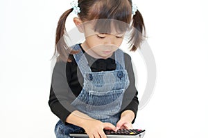 Japanese girl using remote controller