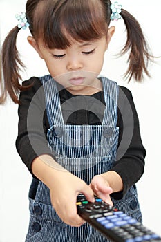 Japanese girl using remote controller