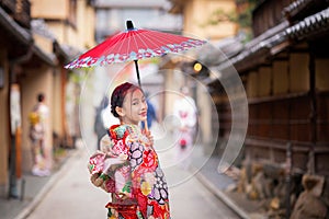 Japanese girl walk in kyoto old market