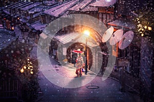 Japanese girl walk with traditional kimono dress in winter season