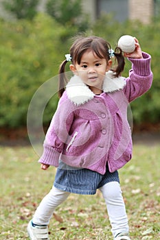 Japanese girl playing catch